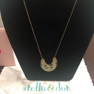 Reversible gold/turquoise and gold/white necklace.